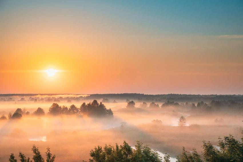 Amazing sunrise sunset over misty landscape sceni 2023 11 27 05 31 42 utc